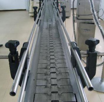 淺談飲料鏈板輸送機(jī)的自動控制系統(tǒng)